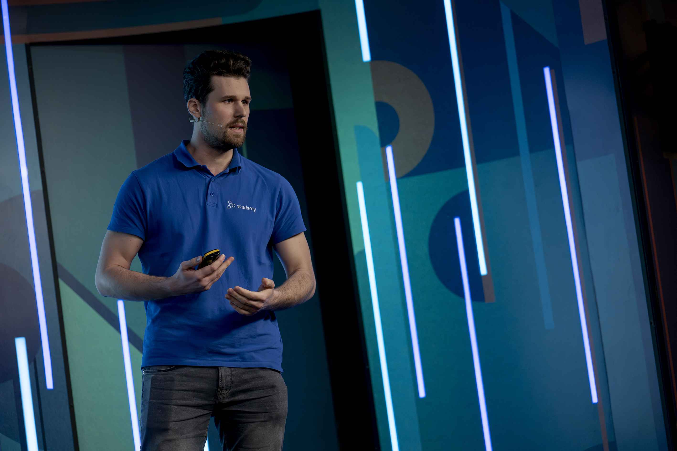 Speaker on a professional conference stage